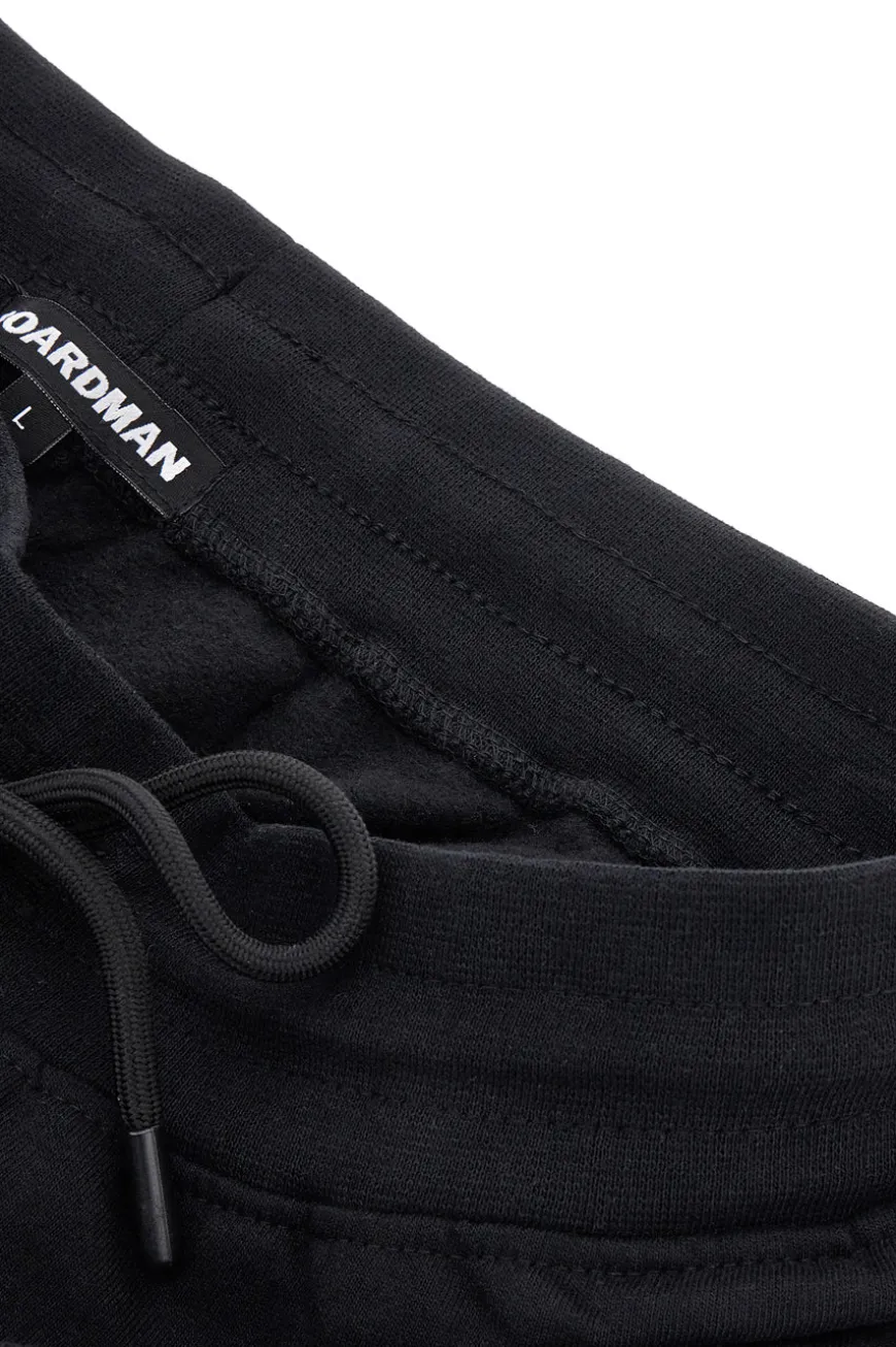 Pantaloni neri in felpa con zip Boardman NBY814