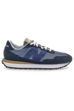 Sneaker blu inserti in pelle New balance M2374EK